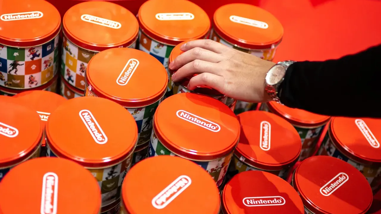 overhead view of corned beef sliced and on a platter with cabbage, potatoes, and carrots