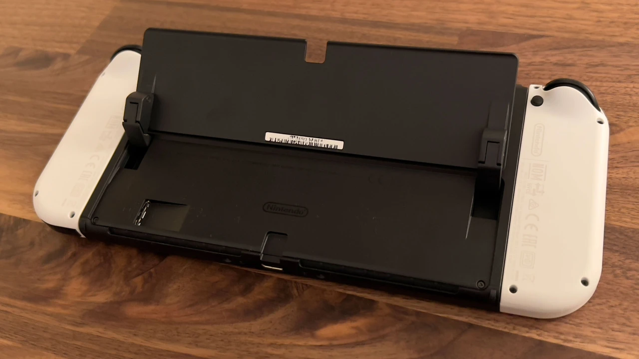 overhead view of corned beef sliced and on a platter with cabbage, potatoes, and carrots